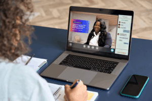 Person watching an ACFCU webinar from their laptop.